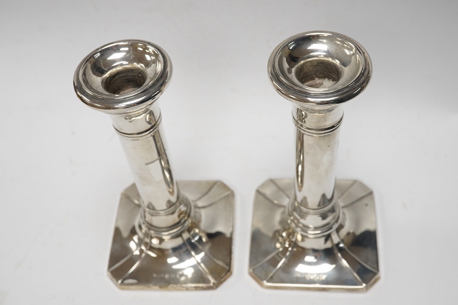 A pair of George V silver mounted dwarf candlesticks, by S. Blankensee & Son Ltd, Birmingham, 1913, 16.2cm, loaded. Condition - poor to fair